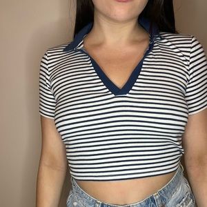 Blue and white striped collard shirt.